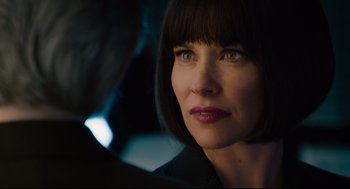 Movie still from “Ant-Man” (2015), directed by Peyton Reed – A person wearing a suit; Close Up shot, Over the shoulder angle
