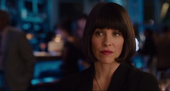 Movie still from “Ant-Man” (2015), directed by Peyton Reed – A person wearing a suit; Close Up shot, Over the shoulder angle