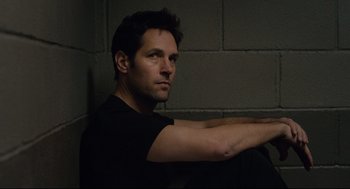 Movie still from “Ant-Man” (2015), directed by Peyton Reed – A person wearing a black shirt; Close Up shot, Low angle