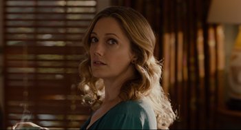 Movie still from “Ant-Man” (2015), directed by Peyton Reed – A person with long blonde hair; Close Up shot, Over the shoulder angle