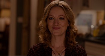 Movie still from “Ant-Man” (2015), directed by Peyton Reed – A person smiling for a picture; Close Up shot, Over the shoulder angle