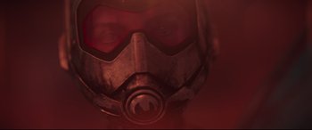 Movie still from “Ant-Man and the Wasp” (2018), directed by Peyton Reed – A person's face wearing a helmet; Close Up shot, Low angle