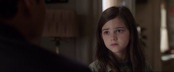 Movie still from “Ant-Man and the Wasp” (2018), directed by Peyton Reed – A little girl sitting in front of a lamp looking sad; Close Up shot, Over the shoulder angle