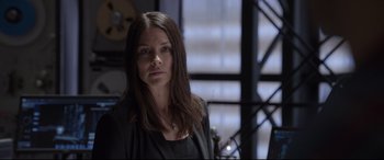 Movie still from “Ant-Man and the Wasp” (2018), directed by Peyton Reed – A woman with long brown hair standing in a room; Close Up shot, Over the shoulder angle