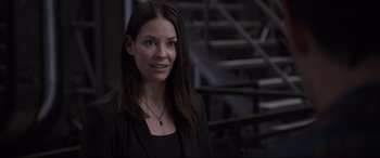 Movie still from “Ant-Man and the Wasp” (2018), directed by Peyton Reed – A woman in a black shirt and black jacket; Close Up shot, Over the shoulder angle