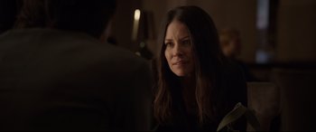 Movie still from “Ant-Man and the Wasp” (2018), directed by Peyton Reed – A woman sitting in a room looking at the camera; Close Up shot, Over the shoulder angle