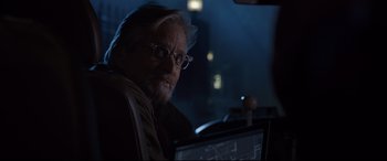 Movie still from “Ant-Man and the Wasp” (2018), directed by Peyton Reed – An older man sitting in front of a computer at night; Close Up shot, Over the shoulder angle