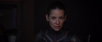 Movie still from “Ant-Man and the Wasp” (2018), directed by Peyton Reed – A person wearing a suit; Close Up shot, Over the shoulder angle