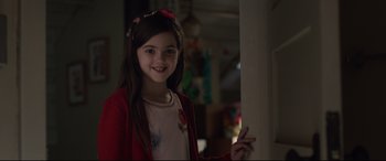 Movie still from “Ant-Man and the Wasp” (2018), directed by Peyton Reed – A young girl smiling for the camera in a room; Close Up shot, Over the shoulder angle