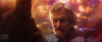 Movie still from “Ant-Man and the Wasp” (2018), directed by Peyton Reed – An older man with a beard and mustache; Close Up shot, Over the shoulder angle