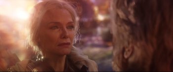 Movie still from “Ant-Man and the Wasp” (2018), directed by Peyton Reed – An older woman looking into the distance with her eyes wide open; Close Up shot, Over the shoulder angle