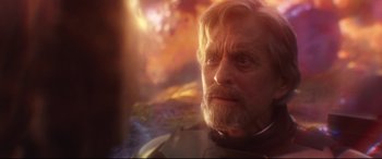 Movie still from “Ant-Man and the Wasp” (2018), directed by Peyton Reed – An older man with a beard and a helmet on; Close Up shot, Over the shoulder angle