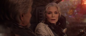 Movie still from “Ant-Man and the Wasp” (2018), directed by Peyton Reed – An older woman looking at the camera while sitting in a vehicle; Close Up shot, Over the shoulder angle