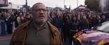 Movie still from “Ant-Man and the Wasp” (2018), directed by Peyton Reed – A crowd of people walking down a street; Medium shot, Low angle