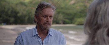 Movie still from “Ant-Man and the Wasp” (2018), directed by Peyton Reed – An older man with grey hair and a blue shirt; Close Up shot, Over the shoulder angle