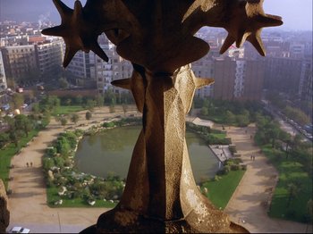 An aerial view of a park and a pond