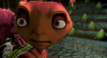 Movie still from “Antz” (1998), directed by Tim Johnson – An image of an animated character looking at the camera; Extreme Close Up shot, High angle