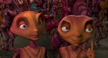 Movie still from “Antz” (1998), directed by Tim Johnson – A couple of people that are standing in the grass; Close Up shot, High angle