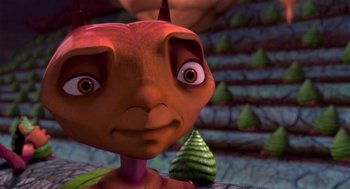 Movie still from “Antz” (1998), directed by Tim Johnson – An image of an animated character with a tree in the background; Close Up shot, High angle