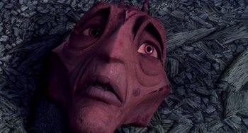 Movie still from “Antz” (1998), directed by Tim Johnson – An image of a face that looks like a demon; Extreme Close Up shot, Overhead angle
