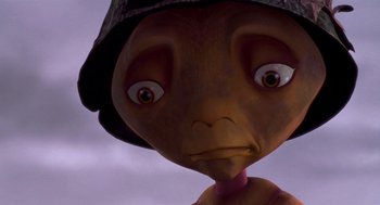 Movie still from “Antz” (1998), directed by Tim Johnson – An animated character with a hat and a sad face; Close Up shot, Low angle