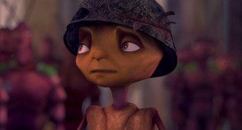 Movie still from “Antz” (1998), directed by Tim Johnson – An animated character wearing a camouflage hat; Close Up shot, High angle