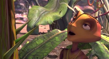Movie still from “Antz” (1998), directed by Tim Johnson – An image of an animated character looking at a plant; Close Up shot, High angle