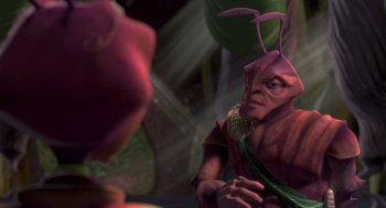 Movie still from “Antz” (1998), directed by Tim Johnson – A person with a strange costume on; Close Up shot, Over the shoulder angle