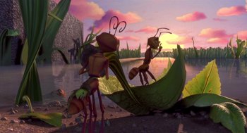 Movie still from “Antz” (1998), directed by Tim Johnson – An animated scene of a group of ants on the ground; Extreme Wide shot, High angle