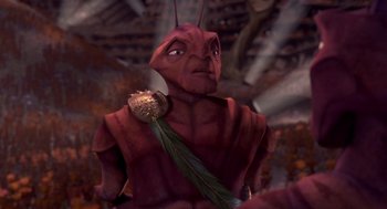 Movie still from “Antz” (1998), directed by Tim Johnson – An image of a person that is dressed like a bug; Close Up shot, High angle