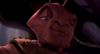 Movie still from “Antz” (1998), directed by Tim Johnson – The face of a red creature; Extreme Close Up shot, High angle