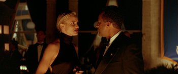 Movie still from “Any Given Sunday” (1999), directed by Oliver Stone – A man and a woman talking to each other; Close Up shot, Low angle