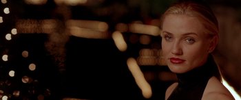 Movie still from “Any Given Sunday” (1999), directed by Oliver Stone – A person with lights in the background; Close Up shot, Over the shoulder angle