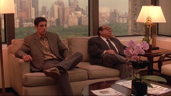 Movie still from “Anything Else” (2003), directed by Woody Allen – Two men sitting on a couch in front of a window; Wide shot, Over the shoulder angle
