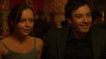 Movie still from “Anything Else” (2003), directed by Woody Allen – A man and a woman sitting next to each other; Close Up shot, Over the shoulder angle