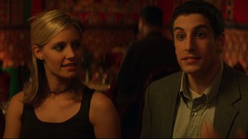 Movie still from “Anything Else” (2003), directed by Woody Allen – A man and a woman sitting next to each other in a room; Close Up shot, Over the shoulder angle