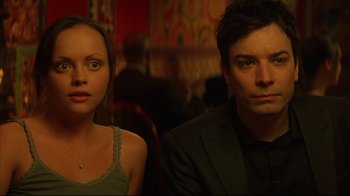 Movie still from “Anything Else” (2003), directed by Woody Allen – A man and a woman sitting at a table in a restaurant; Close Up shot, Over the shoulder angle