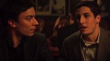 Movie still from “Anything Else” (2003), directed by Woody Allen – A couple of men sitting next to each other in a room; Close Up shot, Over the shoulder angle