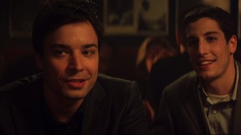 Movie still from “Anything Else” (2003), directed by Woody Allen – A person wearing a suit; Close Up shot, Over the shoulder angle