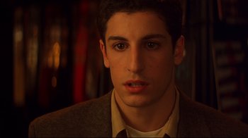 Movie still from “Anything Else” (2003), directed by Woody Allen – A person wearing a jacket; Close Up shot, High angle