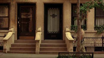 Movie still from “Anything Else” (2003), directed by Woody Allen – Two fire hydrants on the front steps of a house; Wide shot, High angle