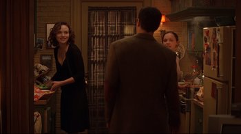 Movie still from “Anything Else” (2003), directed by Woody Allen – Two women and a man standing in front of a mirror; Medium shot, Over the shoulder angle