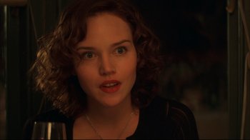 Movie still from “Anything Else” (2003), directed by Woody Allen – A person with curly brown hair; Close Up shot, Over the shoulder angle