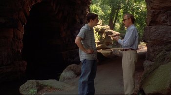 Movie still from “Anything Else” (2003), directed by Woody Allen – A man and a boy standing next to each other in the woods; Medium shot, Over the shoulder angle