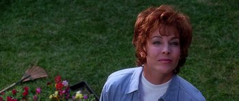 Movie still from “Apollo 13” (1995), directed by Ron Howard – A person with short hair; Close Up shot, Over the shoulder angle