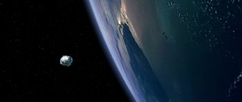 Movie still from “Apollo 13” (1995), directed by Ron Howard – A view of the earth from the space station; Extreme Wide shot, Overhead angle