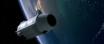 Movie still from “Apollo 13” (1995), directed by Ron Howard – A view of the earth from the side of an airplane; Extreme Wide shot, Overhead angle