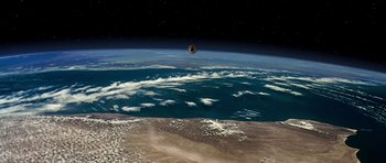 Movie still from “Apollo 13” (1995), directed by Ron Howard – An image of an earth from space; Extreme Wide shot, Overhead angle