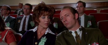 Movie still from “Apollo 13” (1995), directed by Ron Howard – A man and a woman sitting next to each other; Close Up shot, Low angle