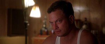 Movie still from “Apollo 13” (1995), directed by Ron Howard – A person wearing a white shirt; Close Up shot, Low angle